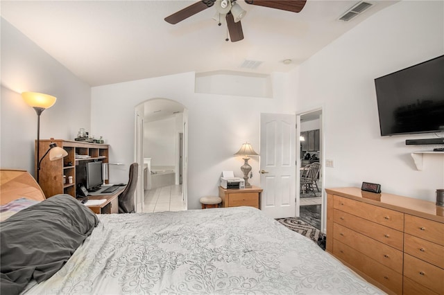 bedroom featuring ensuite bath, ceiling fan, and light colored carpet