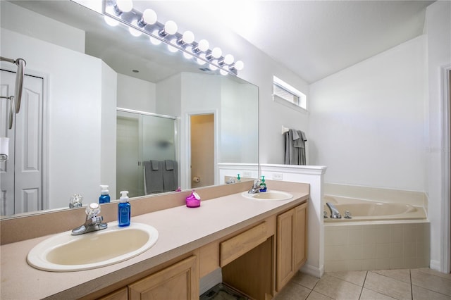 bathroom with vanity, plus walk in shower, and tile patterned flooring