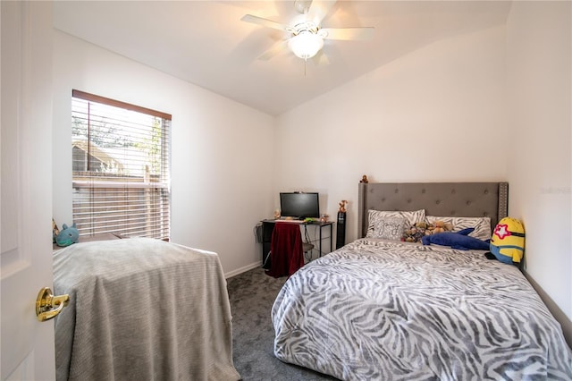 carpeted bedroom with vaulted ceiling and ceiling fan