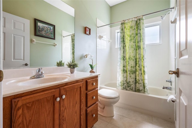 full bathroom with vanity, shower / bath combo with shower curtain, toilet, and tile patterned floors