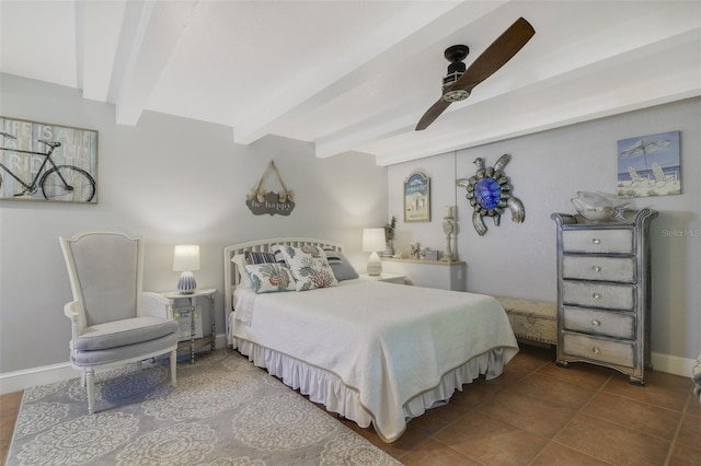 tiled bedroom with ceiling fan and beam ceiling