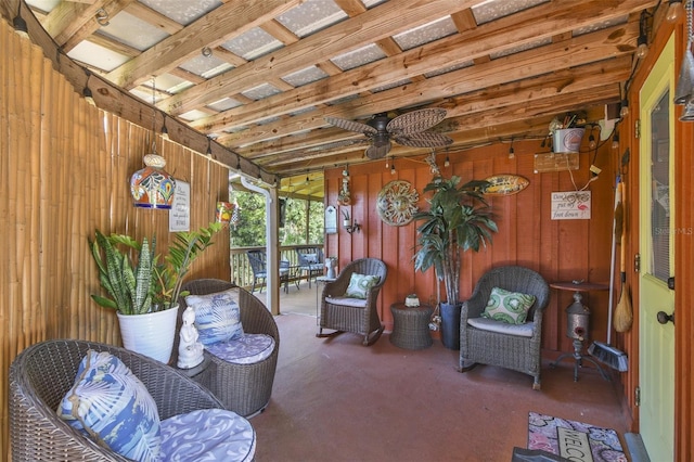 sunroom / solarium with ceiling fan