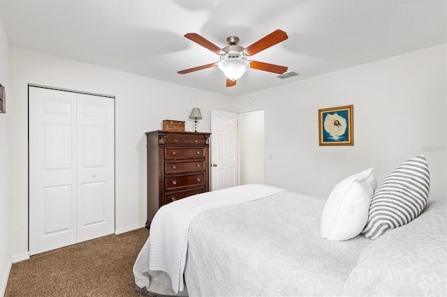 bedroom featuring a closet, ceiling fan, and carpet floors