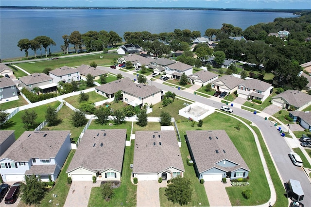 bird's eye view with a water view