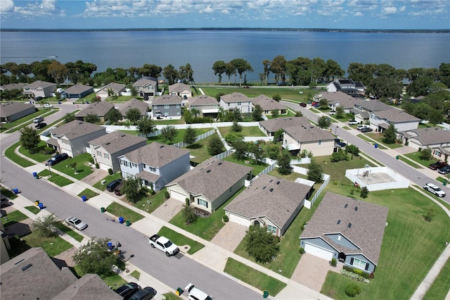 bird's eye view with a water view