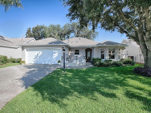 ranch-style house with a garage, a front lawn, and central AC