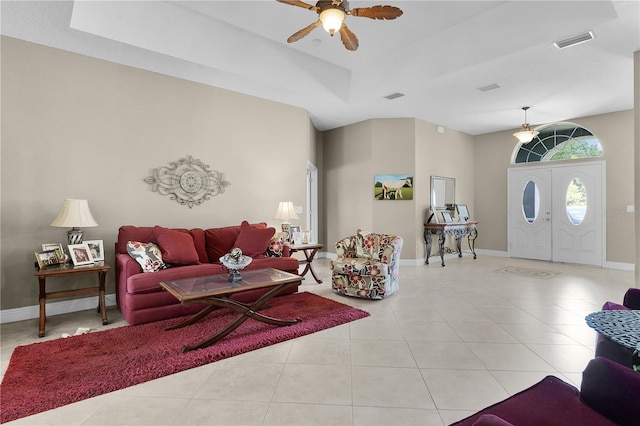 living room featuring ceiling fan and light tile patterned flooring