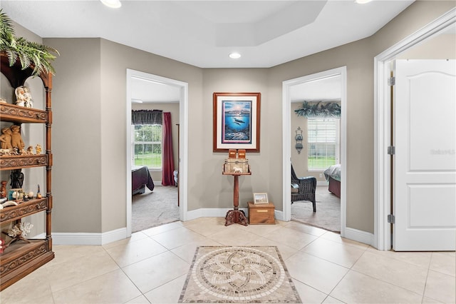 foyer entrance featuring light tile patterned floors