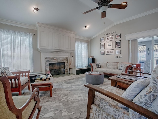 living room with a wealth of natural light, lofted ceiling, crown molding, and ceiling fan