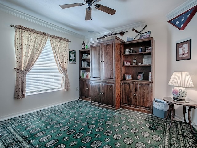 interior space with ornamental molding and ceiling fan