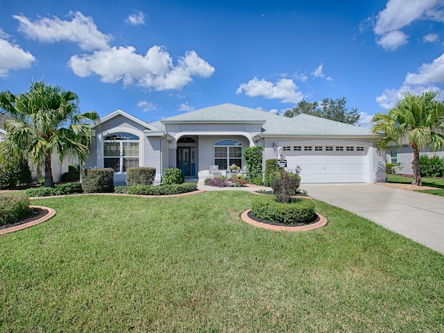 single story home with a front lawn and a garage