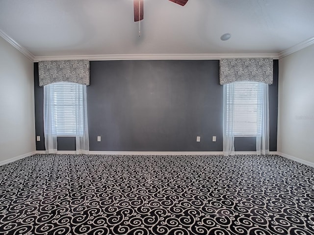 unfurnished room with crown molding, carpet, and ceiling fan