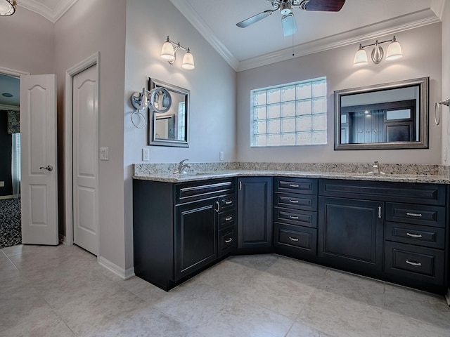 bathroom featuring vanity, crown molding, and ceiling fan