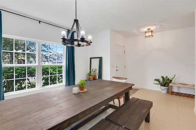 dining area with a notable chandelier