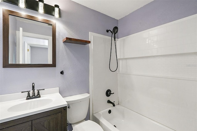 full bathroom featuring vanity, shower / bath combination, and toilet