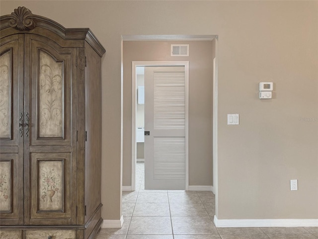 entryway featuring light tile patterned flooring