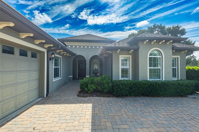 property entrance featuring a garage