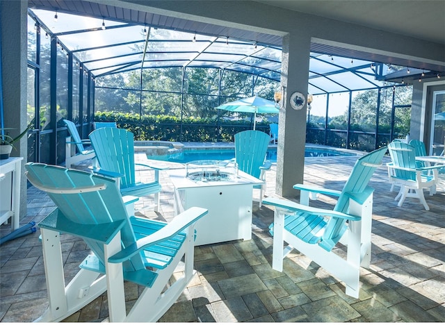 view of patio / terrace with a lanai