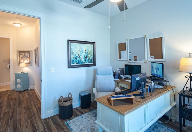 office area with dark hardwood / wood-style floors and ceiling fan