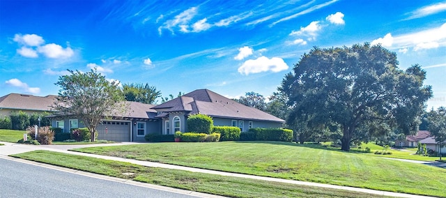 view of property exterior with a lawn and a garage