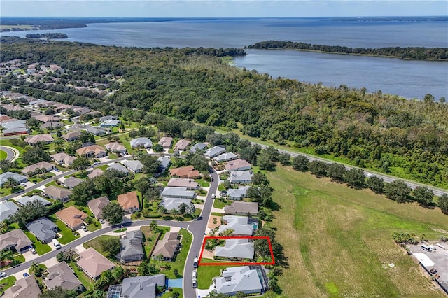 birds eye view of property featuring a water view