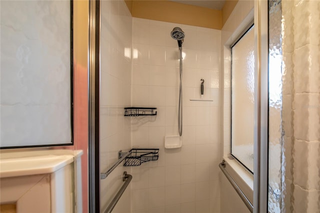 bathroom with an enclosed shower