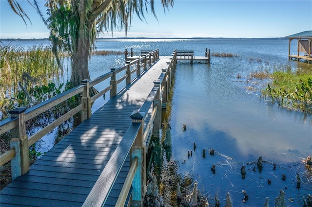 view of dock with a water view