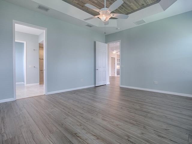 unfurnished room featuring light hardwood / wood-style flooring and ceiling fan