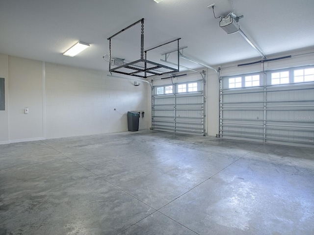 garage featuring a garage door opener