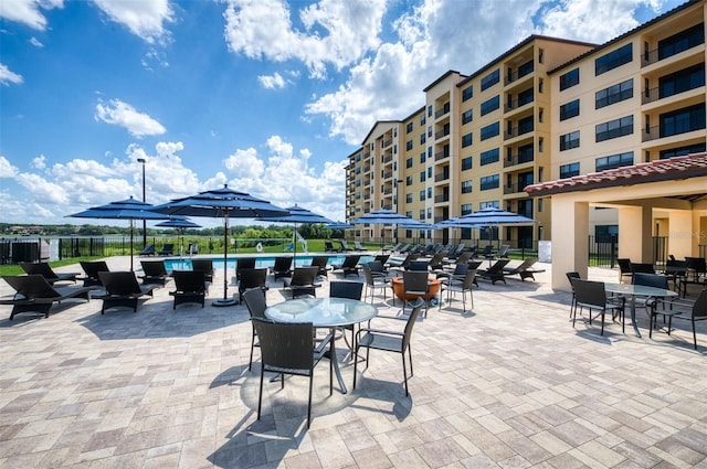 view of patio / terrace with a balcony