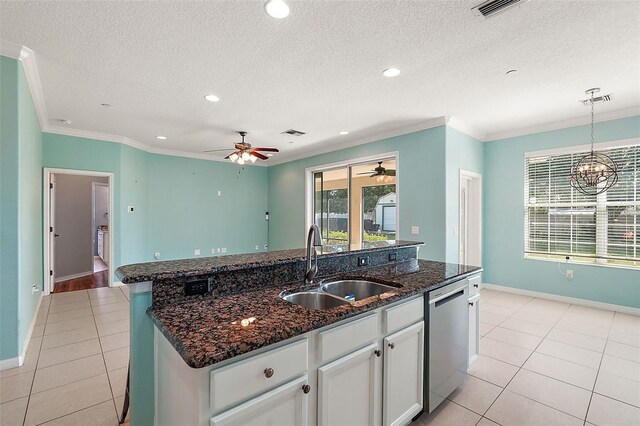 kitchen with sink, stainless steel dishwasher, dark stone counters, a center island with sink, and white cabinets