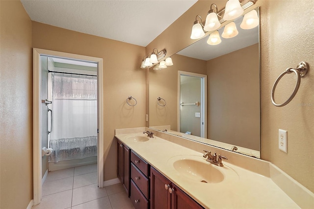 bathroom featuring tile patterned floors and vanity