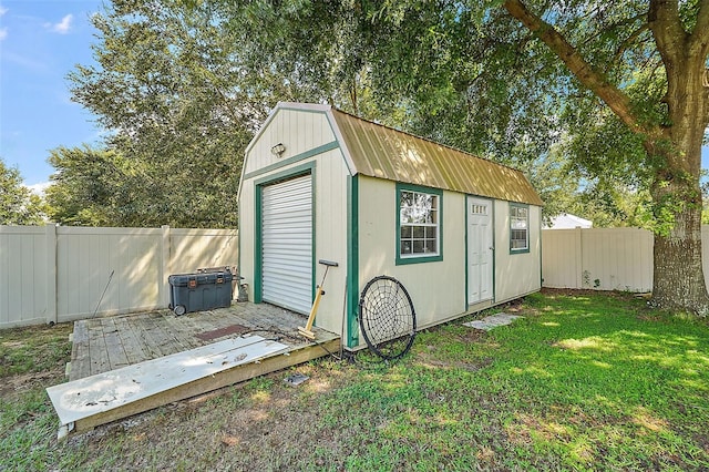 view of outdoor structure featuring a yard