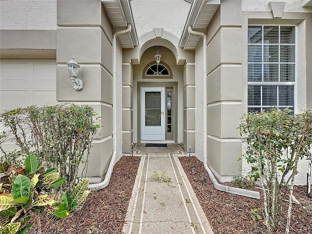 property entrance featuring a garage