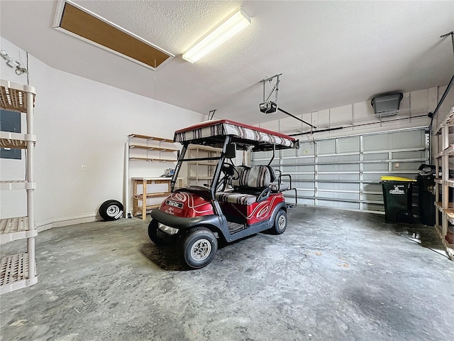 garage featuring a garage door opener