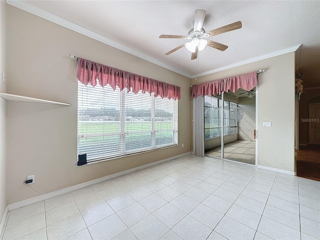 unfurnished bedroom featuring a closet, ornamental molding, a textured ceiling, tile patterned flooring, and ceiling fan