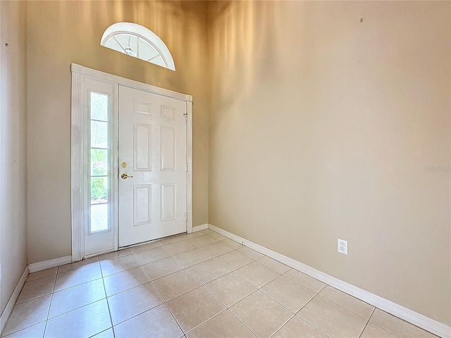 entrance foyer with light tile patterned floors