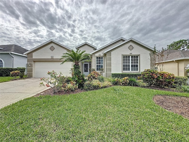 ranch-style home featuring a garage and a front yard