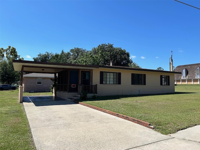 ranch-style house with a front lawn and a carport