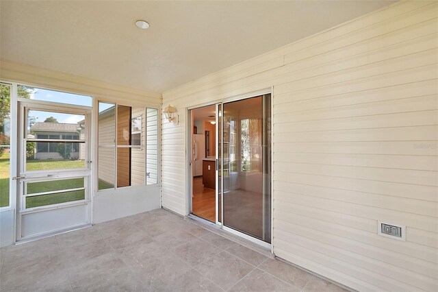 view of unfurnished sunroom