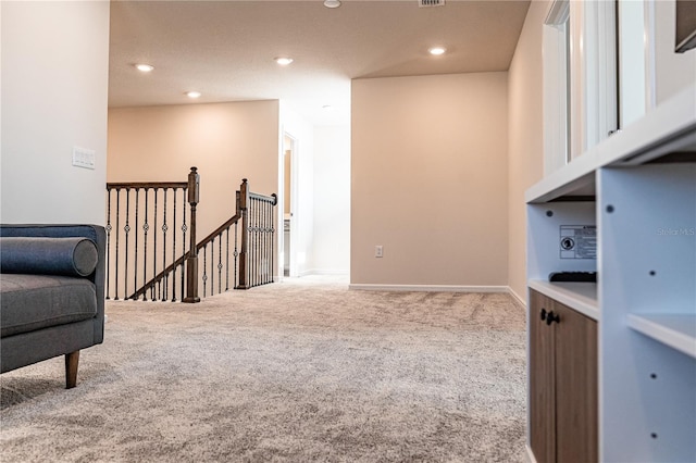 interior space featuring light colored carpet