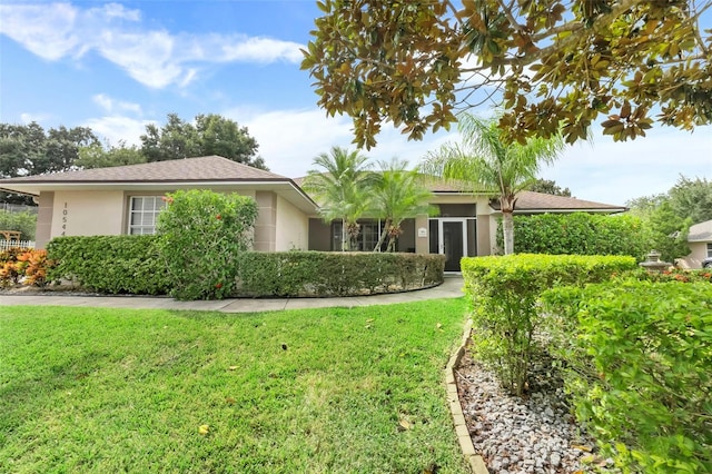 view of front of house with a front lawn