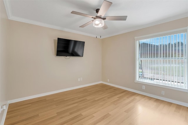 unfurnished room with light hardwood / wood-style flooring, ceiling fan, and crown molding