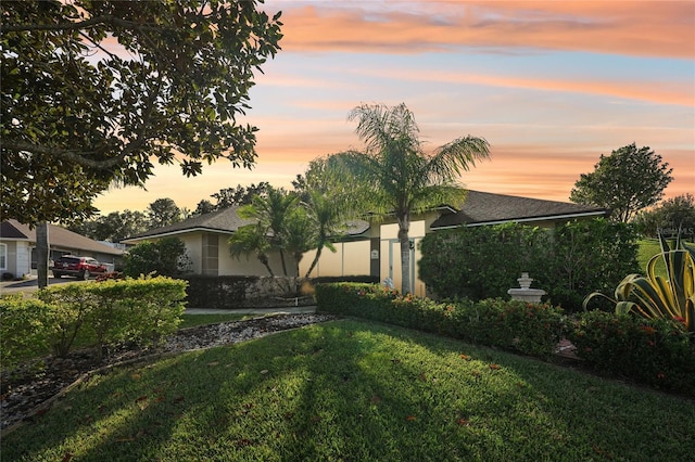 view of front of home featuring a yard