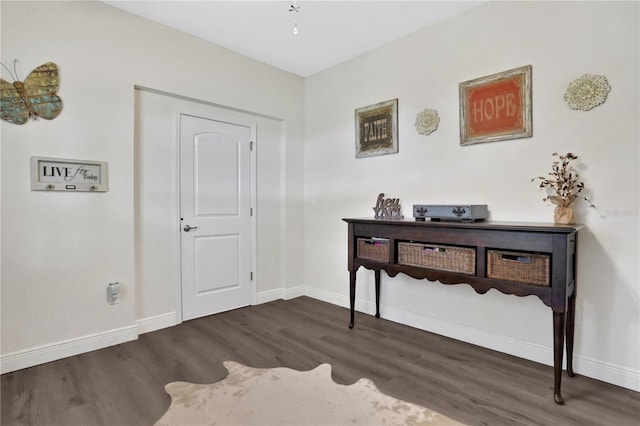 entrance foyer with dark hardwood / wood-style floors