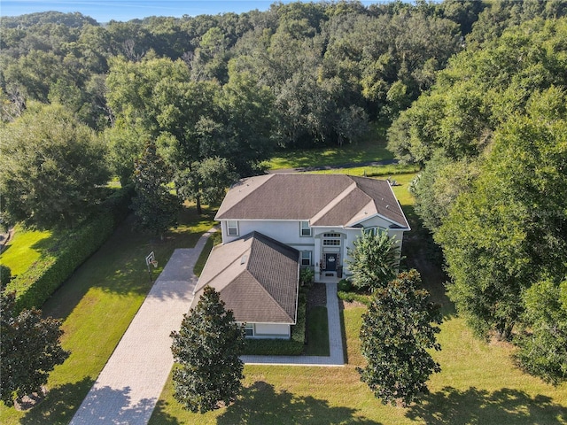 bird's eye view featuring a view of trees