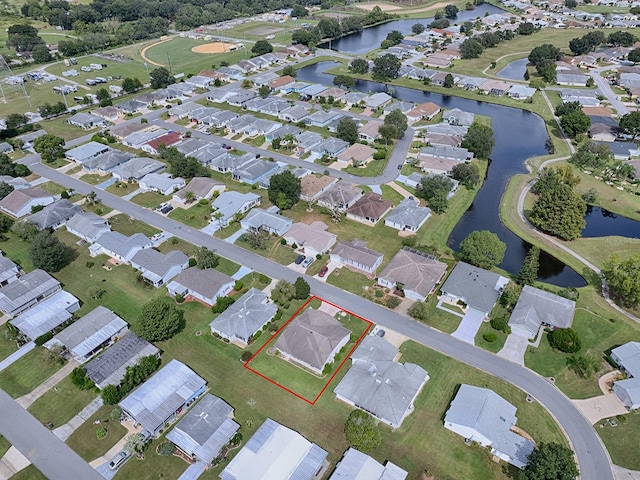 drone / aerial view with a water view