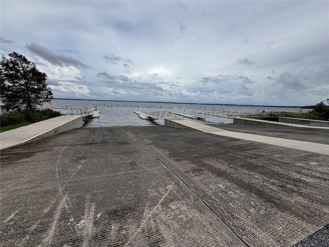 dock area featuring a water view