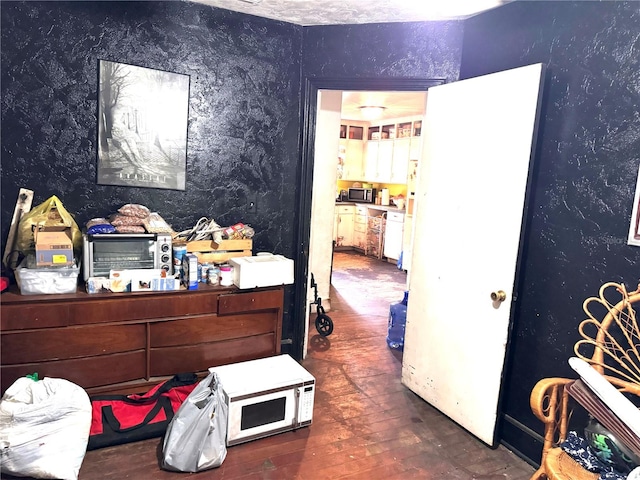 bedroom featuring hardwood / wood-style flooring