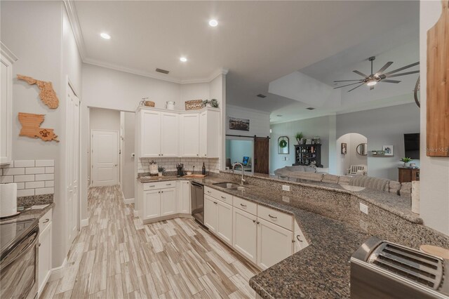 kitchen with ceiling fan, sink, white cabinetry, dishwasher, and crown molding